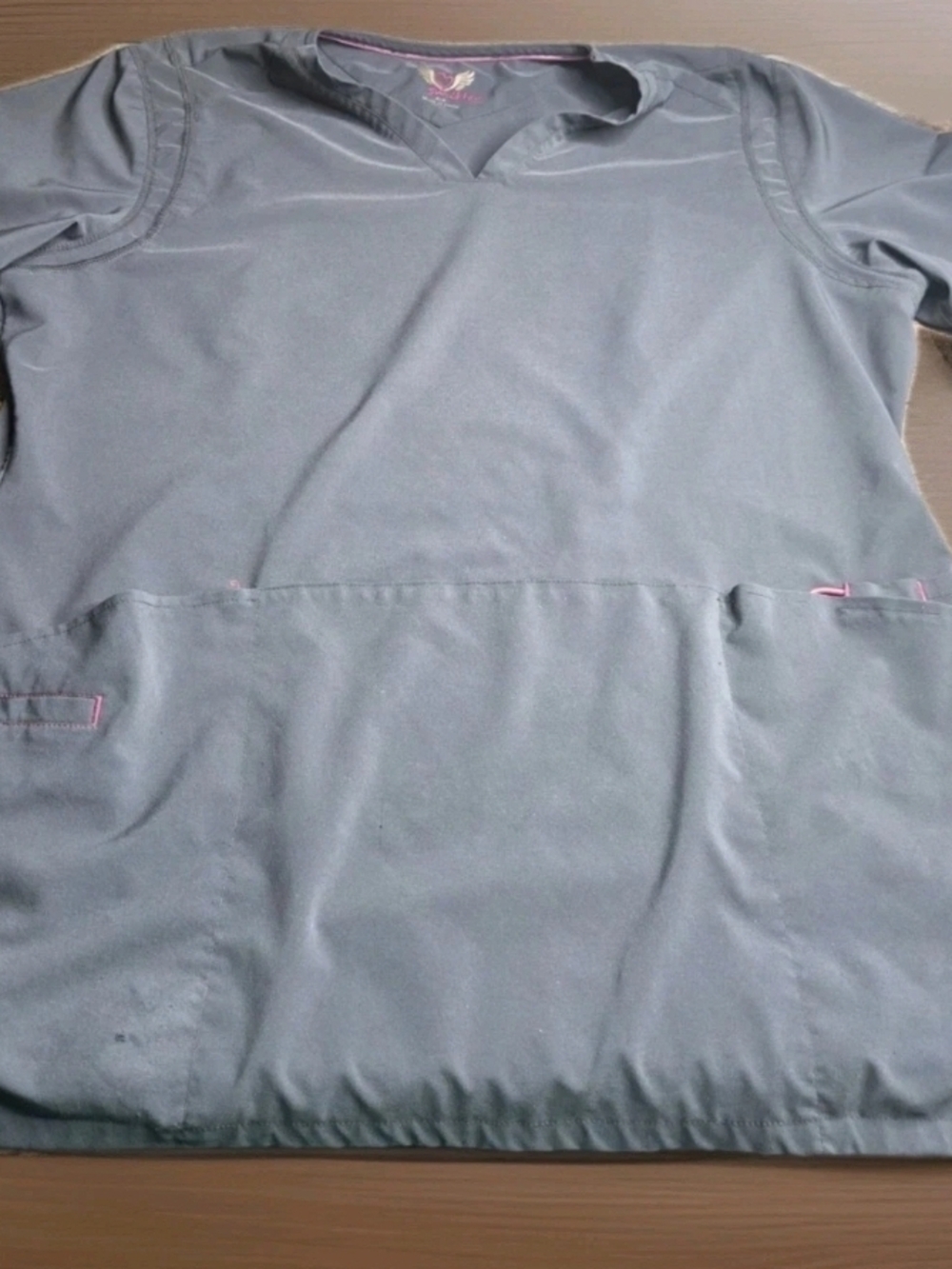 smitten gray scrub top with pink accents